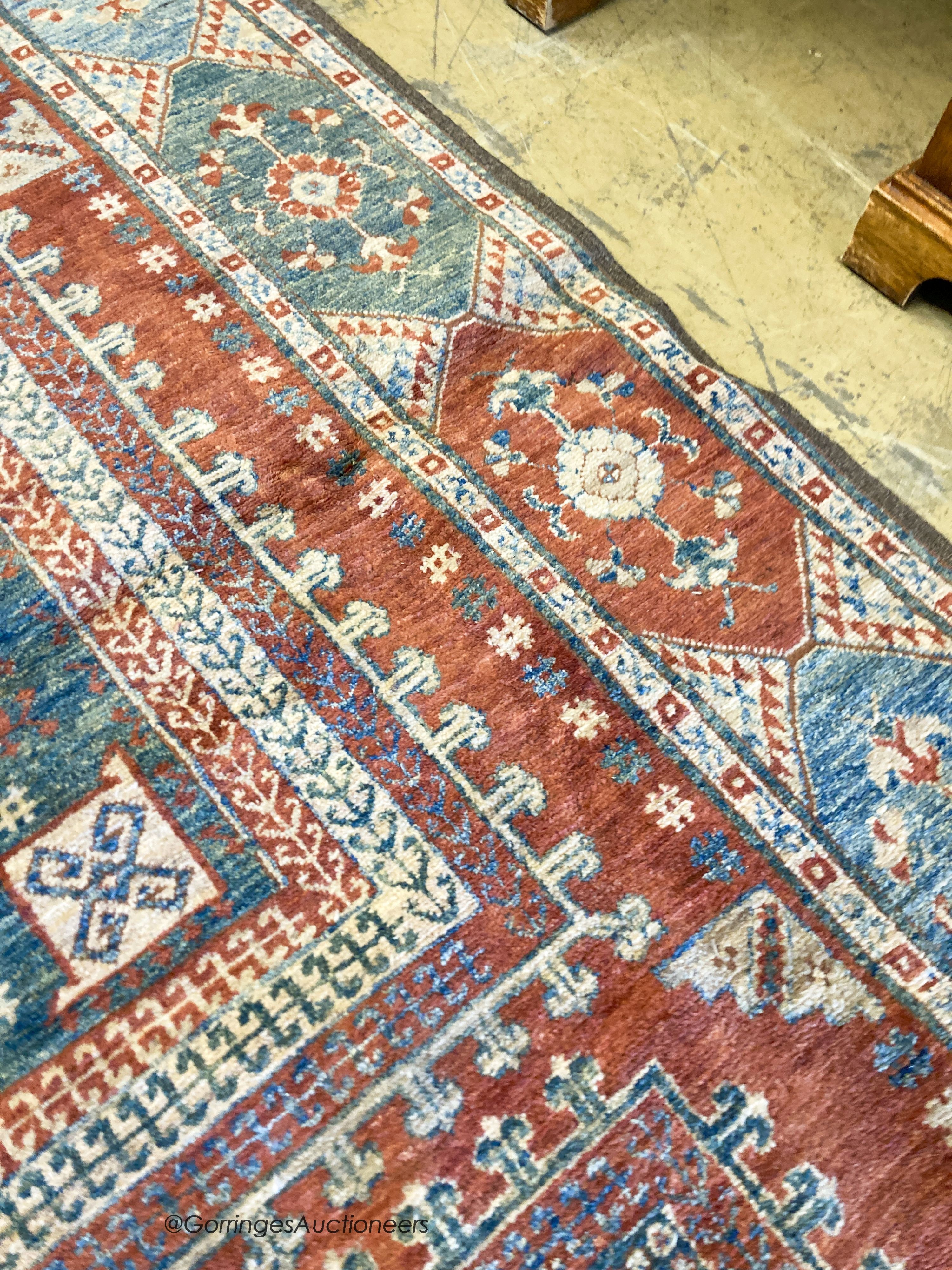 A Caucasian design carpet, 240 x 170cm